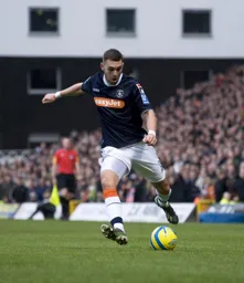 Greg Taylor puts in a cross from the left wing
