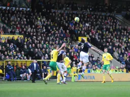 Jon Shaw heads the ball forward