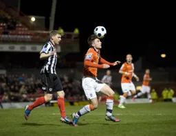 JJ O`Donnell appears to balance the ball on his head