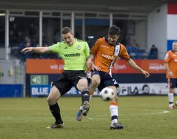 Jonathan Smith gets stuck in to some midfield action