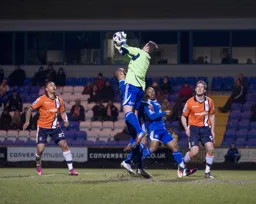 Andre Gray and Jon Shaw show their dismay as Peter Winn gathers the ball