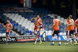Scott Rendell and Andre Gray celebrate after Rendell had scored Town`s first goal