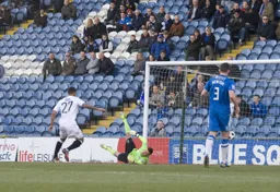Andre Gray watches as Jake Howells shot produces the only goal of the game