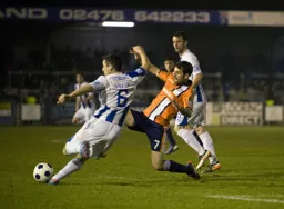 Alex Lawless lunges in to make a tackle