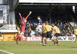 Jon Shaw heads the ball past Nick Pope for Town`s first goal