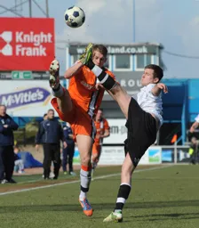 A high boot stops Dan Walker in his tracks
