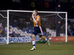 MAIN PAGE Dave Martin celebrates his and Town`s first goal of the match