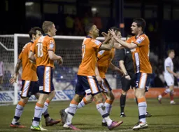 Andre Gray celebrates his goal with Ronnie Henry