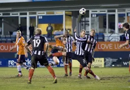 Dave Martin goes for an acrobatic effort