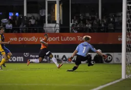 Andre Gray goes close