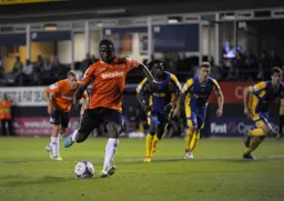 Solomon Taiwo converts the penalty to give Luton the lead