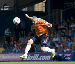 Steve McNulty heads clear