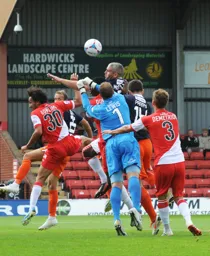 Steve McNulty puts pressure on