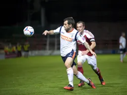 Alex Lawless is about to take control of the ball