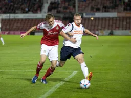 Scott Griffiths in a battle for the ball