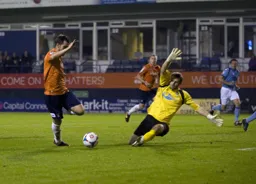 Alex Lawless is about to score the third