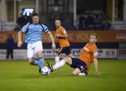 Jim Stevenson wins the ball