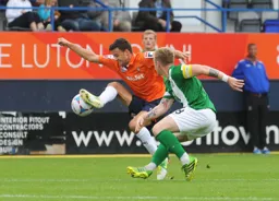 Jonathan Smith controls the ball