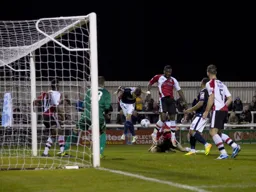 Alex Lacey heads in the second