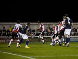 The ball is on its way into the net from a Mark Cullen header to give Luton the lead
