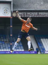 Alex Wall celebrates his wonder strike