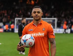 Andre Gray with the match ball
