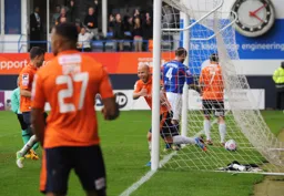 Luke Guttridge is all smiles after scoring