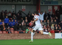 Jonathan Smith celebrates his equaliser