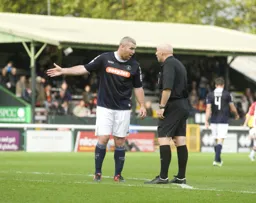 Steve McNulty talks to the ref
