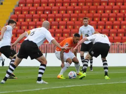 Andre Gray faces a packed defence