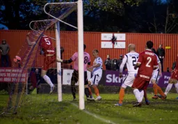 The ball is in the back of the net from Paul Benson's header