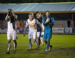 Mark Tyler applauds the travelling fans