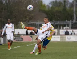 Zane Banton flicks the ball on