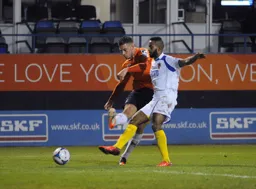 Alex Wall gets a shot away