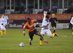 Pelly Mpanzu making sure he gets to the ball first
