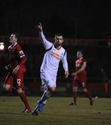 Alex Lawless celebrates