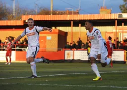 Scott Griffiths and Andre Gray celebrate the latter's goal