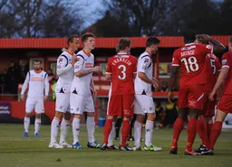 Alfie Mawson (centre) on his only appearance for the Hatters