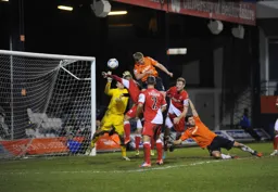Scott Griffiths heads in the Town's fifth goal