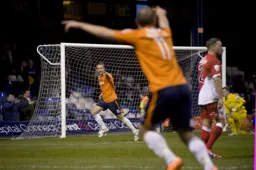 Paul Benson celebrates scoring the second goal