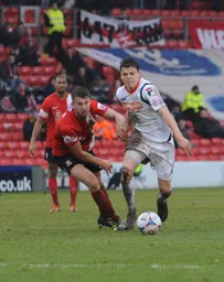 Matthew Robinson coming away with the ball