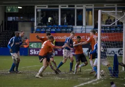 The pitch is a little wet after the downpour