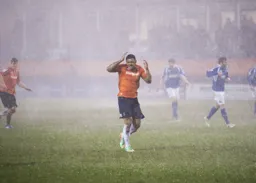 The torrential downpour is the only thing that could put Andre Gray off his game!