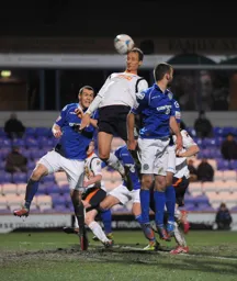 Paul Benson wins a header