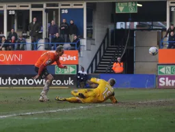 Paul Benson scores the third goal