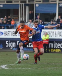 Andre Gray tries to come away with the ball
