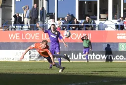Paul Benson dives to head in the third goal