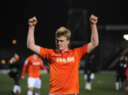 Cameron McGeehan celebrates the three points