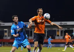 Paul Benson controls the ball with his chest