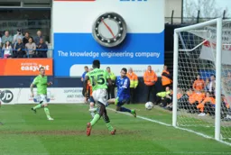 Mark Cullen (obstructed) scores after a piece of indivdual brilliance